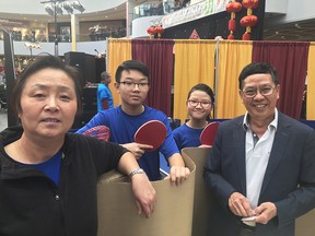 From left to right Shuying Li head coach of Team Alberta, Daniel Jiang, Judy Pan and Peter Vuong President of Alberta Table Tennis Association standing at Lunar New Year Extravaganza at the West Edmonton Mall Ice Palace on Saturday January 12, 2018.