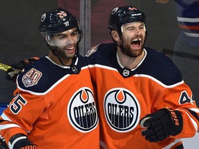 Edmonton Oilers Zack Kassian (44) celebrates his first goal with Darnell Nurse (25) against the Buffalo Sabres during NHL action at Rogers Place in Edmonton, Jan. 14, 2019.