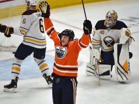 Edmonton Oilers Milan Lucic (27) scores on Buffalo Sabres goalie Carter Hutton (40) during NHL action at Rogers Place in Edmonton, January 14, 2019.