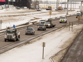 A small convoy of trucks coming in from Lamont on highway 16 near Sherwood Park make there way to the Anthony Henday Drive on Tuesday, Jan. 22, 2019.