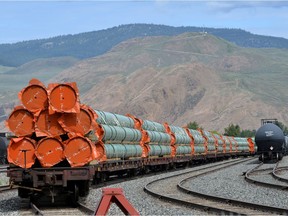 FILE PHOTO: Steel pipe to be used in the oil pipeline construction of Canada's Trans Mountain expansion project sit on rail cars at a stockpile site in Kamloops, British Columbia, Canada May 29, 2018.