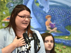 Deanna Emberg with her daughter, Natalie, 8, was a driving force behind a government announcement releasing guidelines to support students with Type 1 diabetes in schools. Ember is speaking at the St. Albert public library on Feb. 12, 2019 after Education Minister David Eggen announced new school guidelines. Ed Kaiser/Postmedia