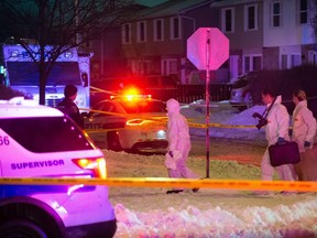 Peel police investigators prepare to enter a home on Hansen Rd. N. in Brampton where 11-year-old Riya Rajkumar was found dead after she was reportedly abducted by her father on Thursday, Feb. 14 2019.