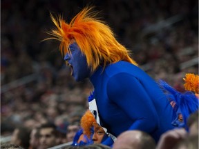 An Edmonton Oilers fan watches the Oilers battle the Chicago Blackhawks on Nov. 1, 2018, during NHL action at Rogers Place.