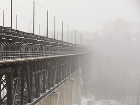 The High Level Bridge disappears into ice fog during a cold snap in Edmonton, on Monday, Feb. 4, 2019. Ian Kucerak/Postmedia