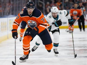 Edmonton Oilers defenceman Oscar Klefbom, left, skates ahead of San Jose Sharks Joonas Donskoi during NHL action on Saturday, Feb. 9, 2019, at Edmonton's Rogers Place.