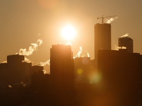 The skyline is seen at sunset at -17 Celcius as an air quality warning is issued by Environment Canada in Edmonton, on Wednesday, Feb. 13, 2019.