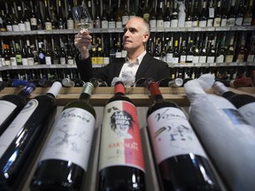 Vivanco export manager Hugo Urquiza checks out a wine sampling from Spain's Rioja region