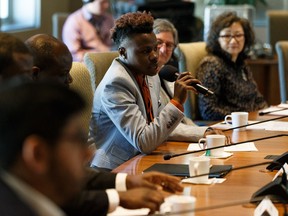 Adebayo Katiiti, the founder and president of LGBTQ refugee organization RARICAnow, speaks during the first meeting of Alberta's Anti-Racism Advisory Council at the Federal Building in Edmonton, on Monday, Feb. 25, 2019.