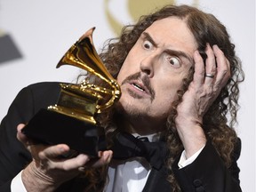 "Weird Al" Yankovic poses with his Grammy Sunday night — he won't be at Grindstone, but his aura will!