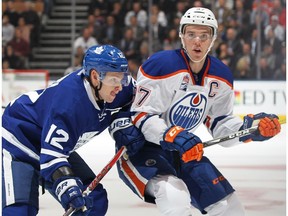 TORONTO, ON - NOVEMBER 1: Connor McDavid #97 of the Edmonton Oilers skates against Connor Brown #12 of the Toronto Maple Leafs during an NHL game at the Air Canada Centre on November 1, 2016 in Toronto, Ontario, Canada.