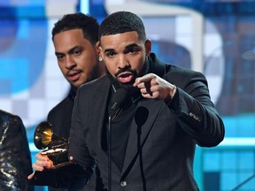 Canadian rapper Drake accepts the award for Best Rap Son for "Gods Plan" during the 61st Annual Grammy Awards on February 10, 2019, in Los Angeles.
