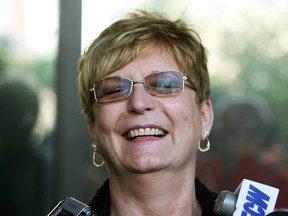 Lesley Miller smiles as she speaks to the media outside the Edmonton Law Courts after Leo Teskey was designated a dangerous offender and handed an indefinite prison sentence. File photo.