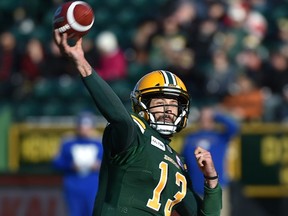 Edmonton Eskimos quarterback Mike Reilly (13) airs one out against the Winnipeg Blue Bombers during CFL action in the last game of the season at Commonwealth Stadium in Edmonton, November 3, 2018.