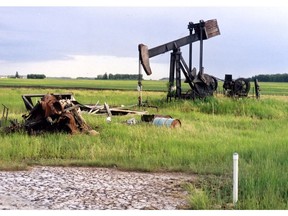 Abandoned oil well equipment marks the almost 23-acre site near Legal which is being cleaned up by the Orphan Well Association. The equipment seen in this photo has been removed, but the serious salt damage, visible in the foreground, could cost the industry-funded group up to $10 million to reclaim. File photo.