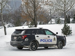 Edmonton police were on scene at the west parking lot at Commonwealth Stadium on Sunday February 3, 2019, where a man's body was discovered in the snow.