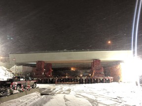 Construction crews installed the first concrete span for the Whitemud LRT Bridge alongside the existing 75 Street bridge over Whitemud Drive near Mill Woods on Feb. 23, 2019. (Photo Supplied/City of Edmonton)