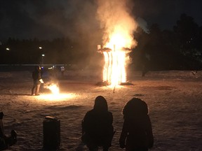 The wooden sculpture is set ablaze at the fire sculpture installation at the Silver Skate Festival in William Hawrelak Park in Edmonton on Saturday, Feb. 9, 2019.