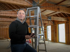 New World Interactive president Keith Warner poses for a photo in what will be their new development studio in Inglewood. The Denver-based video game developer chose Calgary for its new location in part because of the city's $100-million economic diversification fund.