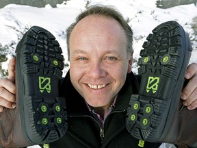 Ken Nichols (President, Gasland Properties Ltd.) with a pair of Kickspike boots, a boot with retractable spikes built into the sole.