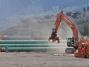 Steel pipe to be used in the oil pipeline construction of Canada's Trans Mountain Expansion Project at a stockpile site in Kamloops on May 29, 2018.