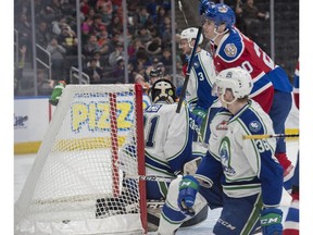 David Kope of the Oil Kings celebrates a second period goal on Riley Lamb of the Swift Current Broncos at Rogers Place on February 26, 2019. For