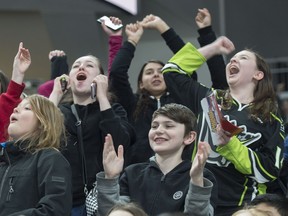 School kids attending the Hockey Hooky day at Rogers Place featuring the Swift Current Broncos and the Edmonton Oil Kings cheer for a first period goal by the Oil Kings on February 26, 2019.