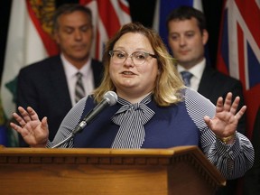 Alberta Health Minister Sarah Hoffman, pictured in a Postmedia file photo, says the government is considering a bill focused on public health care.