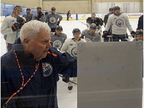 Edmonton Oilers head coach Ken Hitchcock (left) talks to his team during team practice in Edmonton on Friday February 8, 2019. The Oilers will play the San Jose Sharks in Edmonton on Saturday February 9, 2019.
