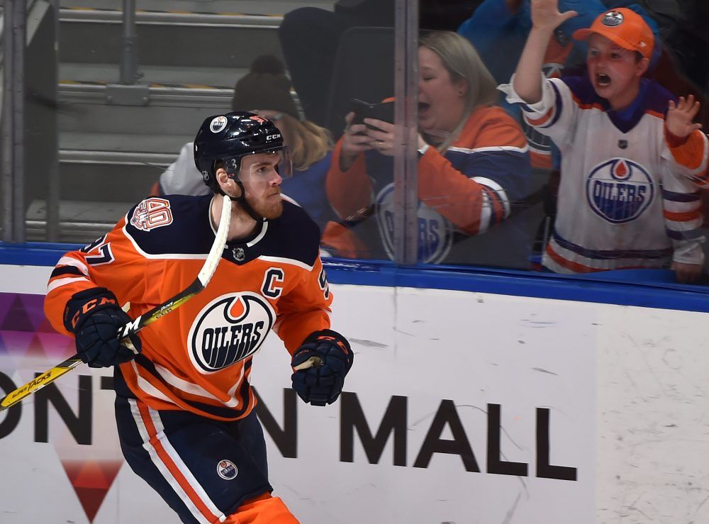 Hockeyplayer Connor McDavid wearing full Hockey gear, Stable Diffusion