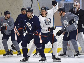 Edmonton Oilers Leon Draisaitl, left, and Jesee Puljujarvi during practice before heading out on the road to face the Penguins Wednesday in Pittsburg at the Community Rink in Edmonton on Monday, Feb. 11, 2019.