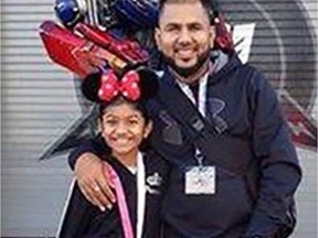 Riya Rajkumar, 11, and Roopesh Rajkumar, 41, are seen in this undated police handout photo. An 11-year-old girl who was allegedly abducted by her father and subject of an Amber Alert on Thursday night has been found dead at a home west of Toronto, police said. Peel regional police issued the alert at 11 p.m. Thursday, several hours after 41-year-old Roopesh Rajkumar failed to return his daughter, Riya, to her mother.