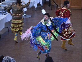 File: Aboriginal dancers from the Bent Arrow Traditional Healing Society performing a traditional Cree welcome dance at a multicultural welcome dinner for new Syrian refugees organized by the Mennonite Centre for Newcomers held at the Portuguese Canadian Hall in Edmonton, April 1, 2016.