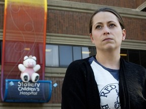 Julie Lawrence, aunt of  Devony Kasawski, stands in front of Stollery Children's Hospital, in Edmonton on Thursday March 14, 2019. Kasawski is currently in the hospital after she and a friend were stuck by a school bus on Hemingway Road at 205 Street on March 8, 2019.