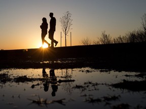 Edmontonians enjoy the sunset from Constable Ezio Faraone Park, in Edmonton Wednesday March 20, 2019.