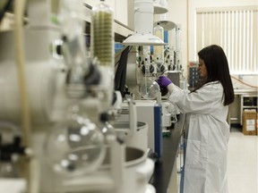 A researcher works in the laboratory at Radient Technologies in Edmonton, on Thursday, March 21, 2019. The company's MAP technology enables extracting, isolating and purifying food/nutraceutical ingredients used in personal care and cosmetics products, and pharmaceutical raw materials. Photo by Ian Kucerak/Postmedia