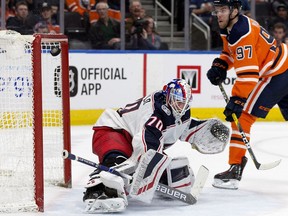 The Edmonton Oilers' Connor McDavid scores on the Columbus Blue Jackets' goalie Joonas Korpisalo (70) during third period NHL action at Rogers Place, in Edmonton Thursday March 21, 2019.