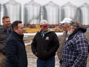 United Conservative Party Leader Jason Kenney (left) meets supporters after an announcement of rural crime initiatives on the Lewis farm outside of Sangudo, Alberta, on Wednesday, March 27, 2019.