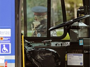 A blood-stained window of an Edmonton Transit System bus parked at the Millwoods Transit Centre on Wednesday September 26, 2018. An Edmonton Transit System bus driver was hospitalized after he was stabbed thirteen times by a youth at the Millwoods Transit Centre early Wednesday morning.
