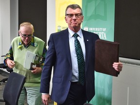 University of Alberta president Dr. David H. Turpin has decided not to seek a second term as president of the university, here walking out with Michael Phair, chair of the University's Board of Governors in Edmonton, March 15, 2019.