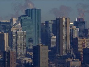 A shrouded view of the downtown Edmonton city skyline on Thursday February 14, 2019 as an extreme cold warning was extended again through Thursday with wind chill values near -40C degrees.