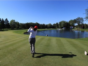 Canada's Lorie Kane tees off on the 10th hole, during the Championship Pro-Am at the 2013 CN Canadian Women's Open, at the Royal Mayfair Golf Club in Edmonton, Alta., Wednesday Aug. 21, 2013. David Bloom/Edmonton Sun/QMI Agency