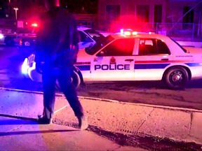 A still from the short-lived Edmonton police reality video series The Squad, which followed officers as they patrolled city streets. Christopher Conlin said his arrest on charges including impersonating a police officer was played up for the cameras. The criminal charges against him were later dropped.