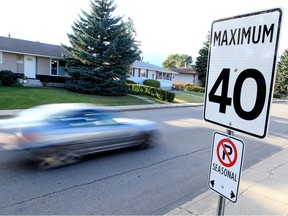 A 40km/hr speed limit sign near 96A Avenue and Ottewell Road, Tuesday October 3, 2012. City residents can now apply to have the speed limit in their community reduced.  DAVID BLOOM EDMONTON SUN  QMI AGENCY ORG XMIT: POS1607242010174602