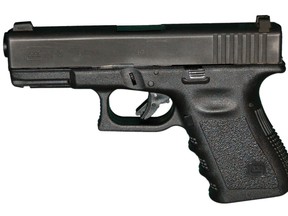 A Glock model 23 / G23 , a .40 handgun.