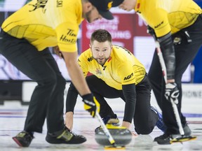 Mike McEwen’s (centre) Team Manitoba blew a 5-0 lead to lose against Team Wild Card on Sunday, then fell to the Yukon yesterday in a 7-6 shocker. It won’t get any easier as Manitoba faces Brad Jacobs and Northern Ontario. (The Canadian Press)