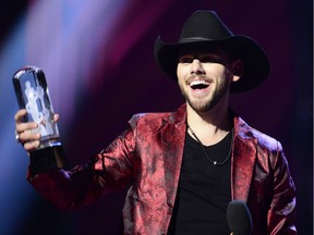 Brett Kissel accepts his award at the Juno Awards in London, Ont., on Sunday, March 17, 2019.