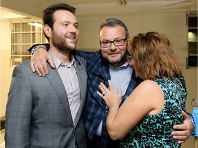 Tony Caterina, centre, hugs his son Rocco Caterina and his wife Orietta Caterina as he celebrates being re-elected as Ward 7 city councillor in 2013. Caterina first hired his son to work in his office in 2008.
