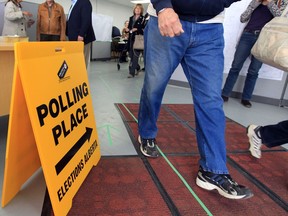 People leave after voting at a polling station on 82 st and 119 ave in Edmonton, Alberta on Wednesday April 29, 2015. File photo.