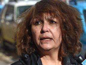Marliss Taylor, Director of Streetworks and Co-Manager of the supervised consumption site at Boyle Street Community Services, speaks to the media outside Alberta Health Services building in Edmonton, February 28, 2019.